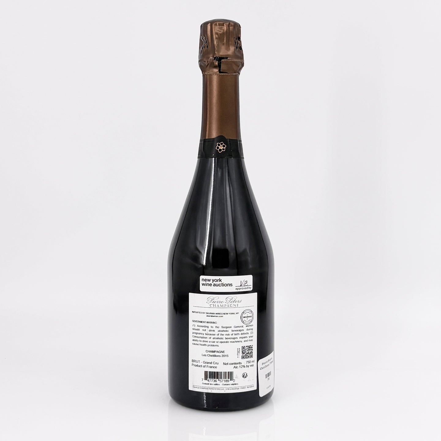 Bottle of wine with a label on a white background