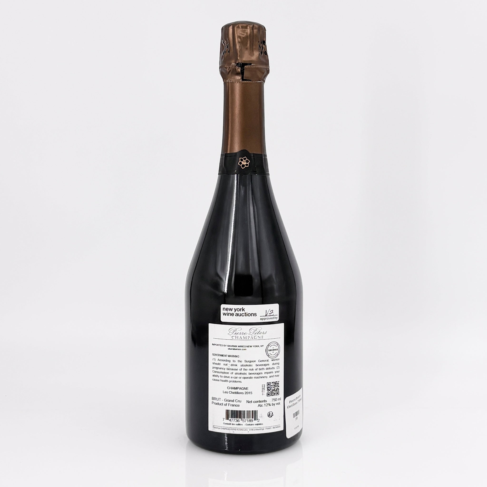 Bottle of wine with a label on a white background