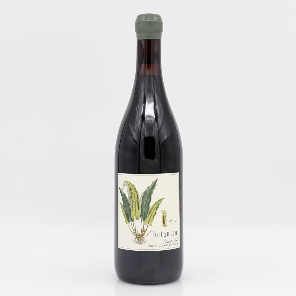 Bottle of wine with a botanical label on a white background