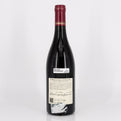 Wine bottle with a visible label on a white background