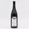 Wine bottle with a visible label on a white background