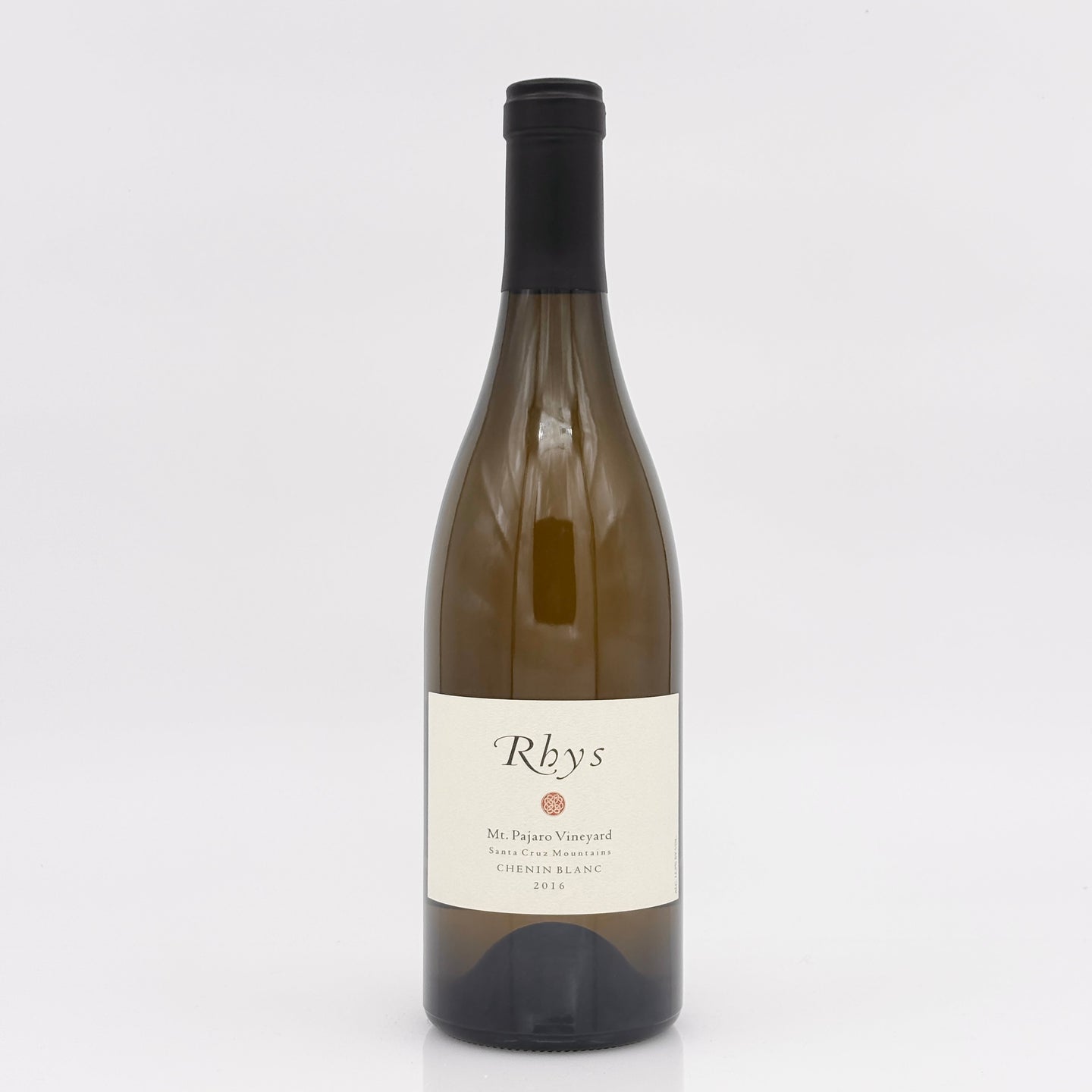 Wine bottle with 'Rhys' label on a white background