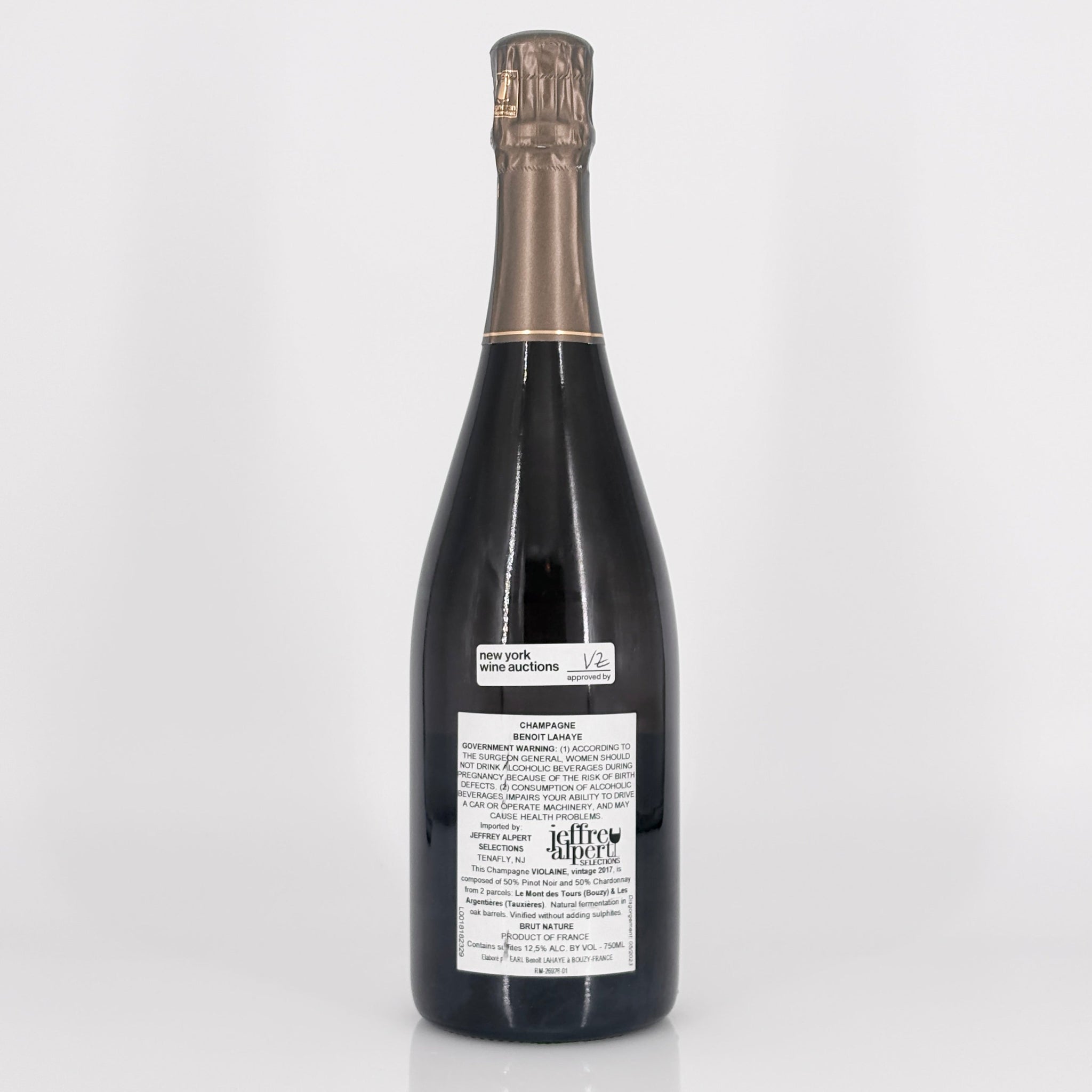 Bottle of wine with a visible label on a white background