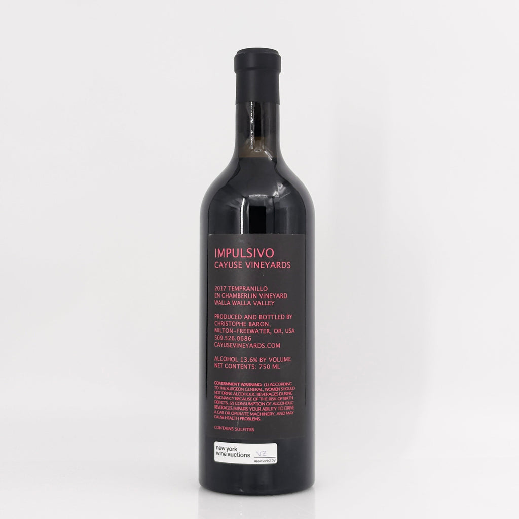 Wine bottle with 'Impulsivo' label on a white background