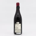 Wine bottle with a visible label on a white background