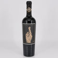 Wine bottle with a unique label on a gray background