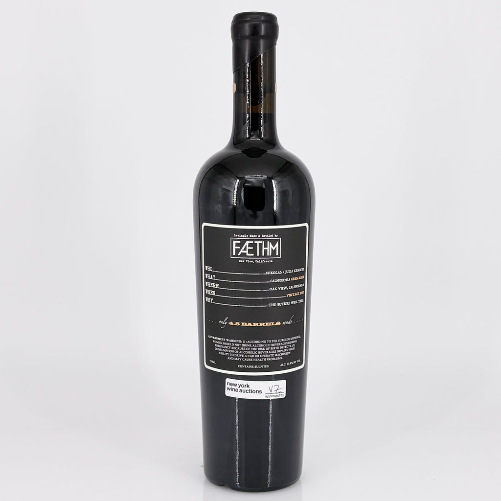 Wine bottle with a black label on a white background