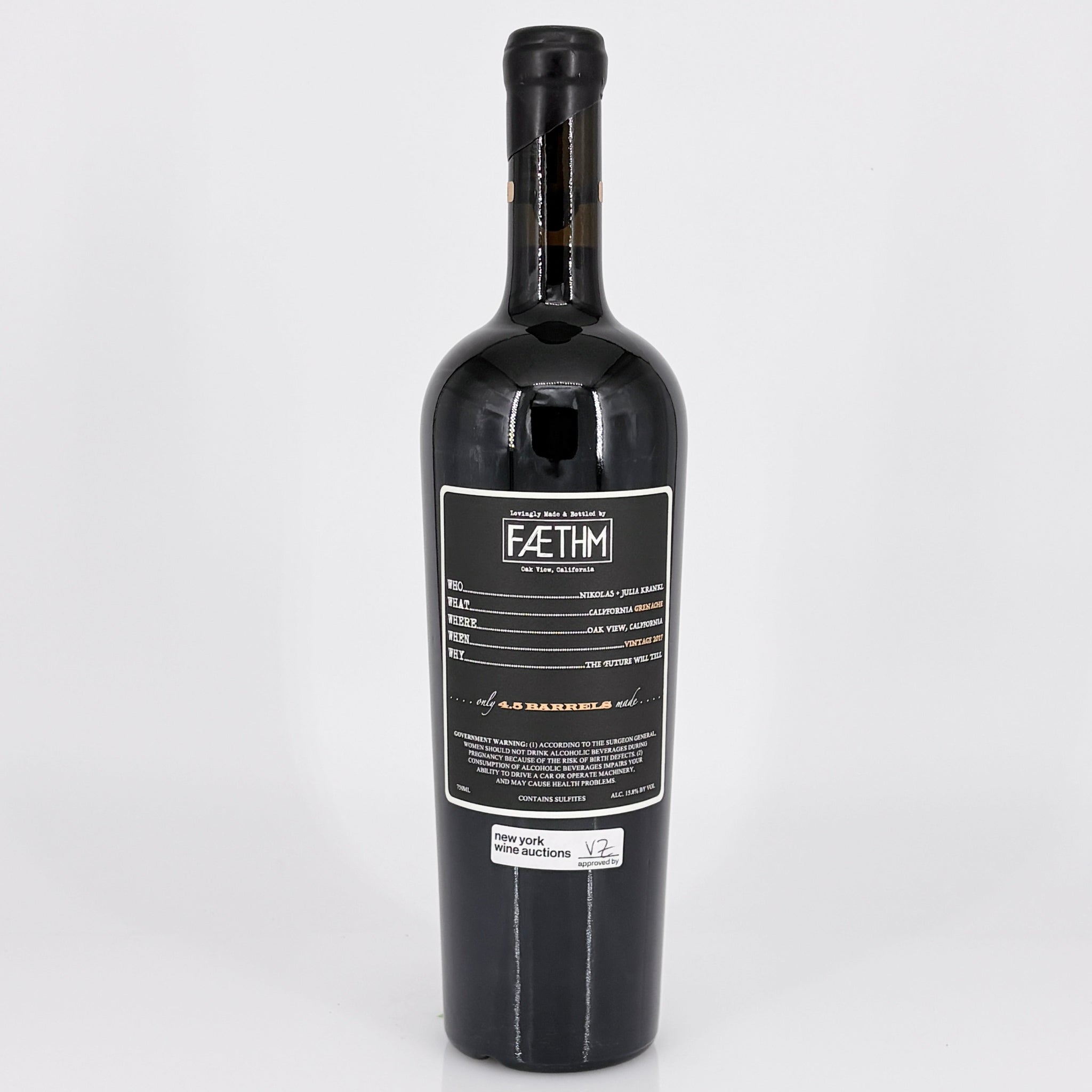 Wine bottle with a black label on a white background