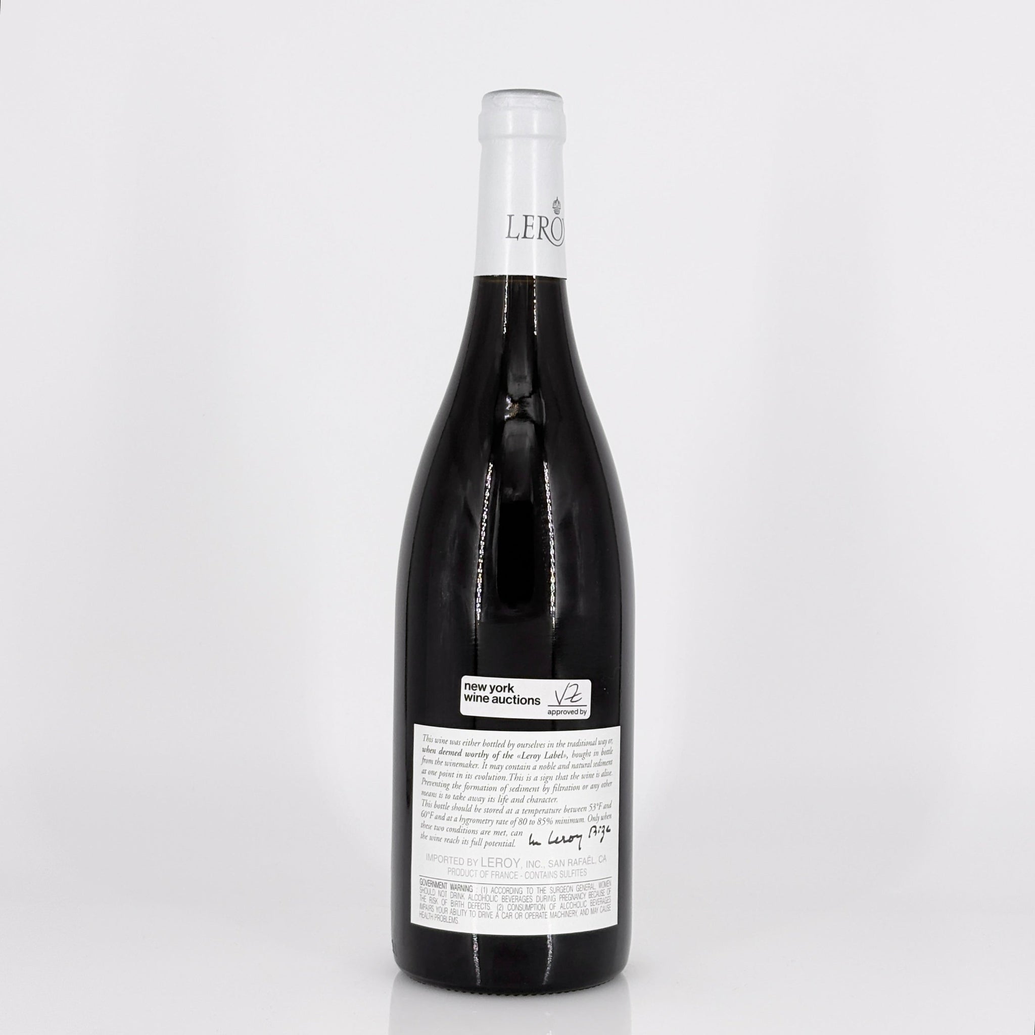 Wine bottle with a visible label on a white background