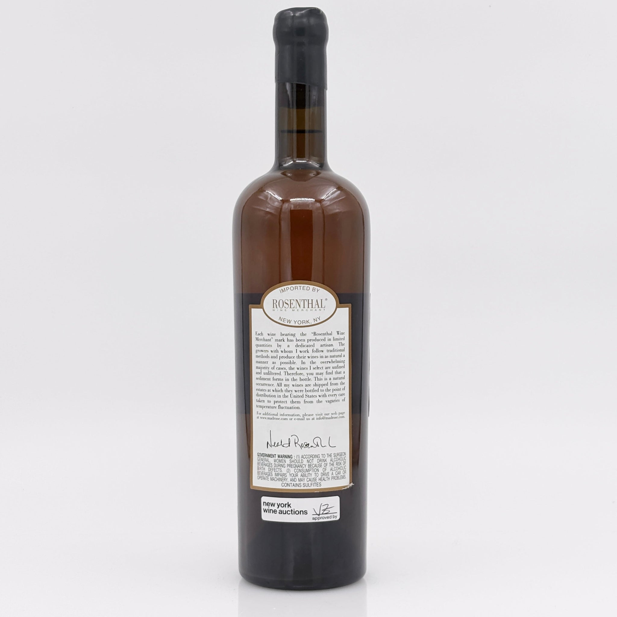 Wine bottle with a label on a white background