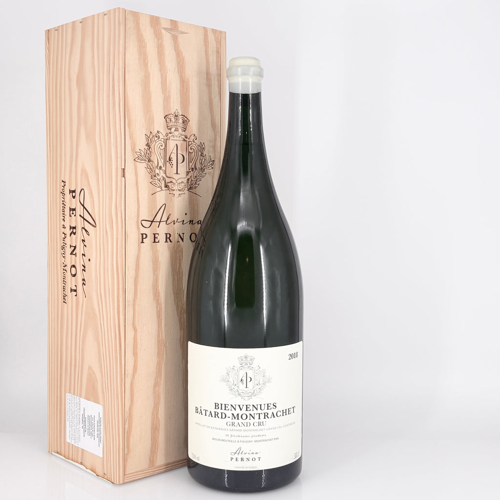 Bottle of wine with a wooden box labeled 'Alvina Pernot' on a white background