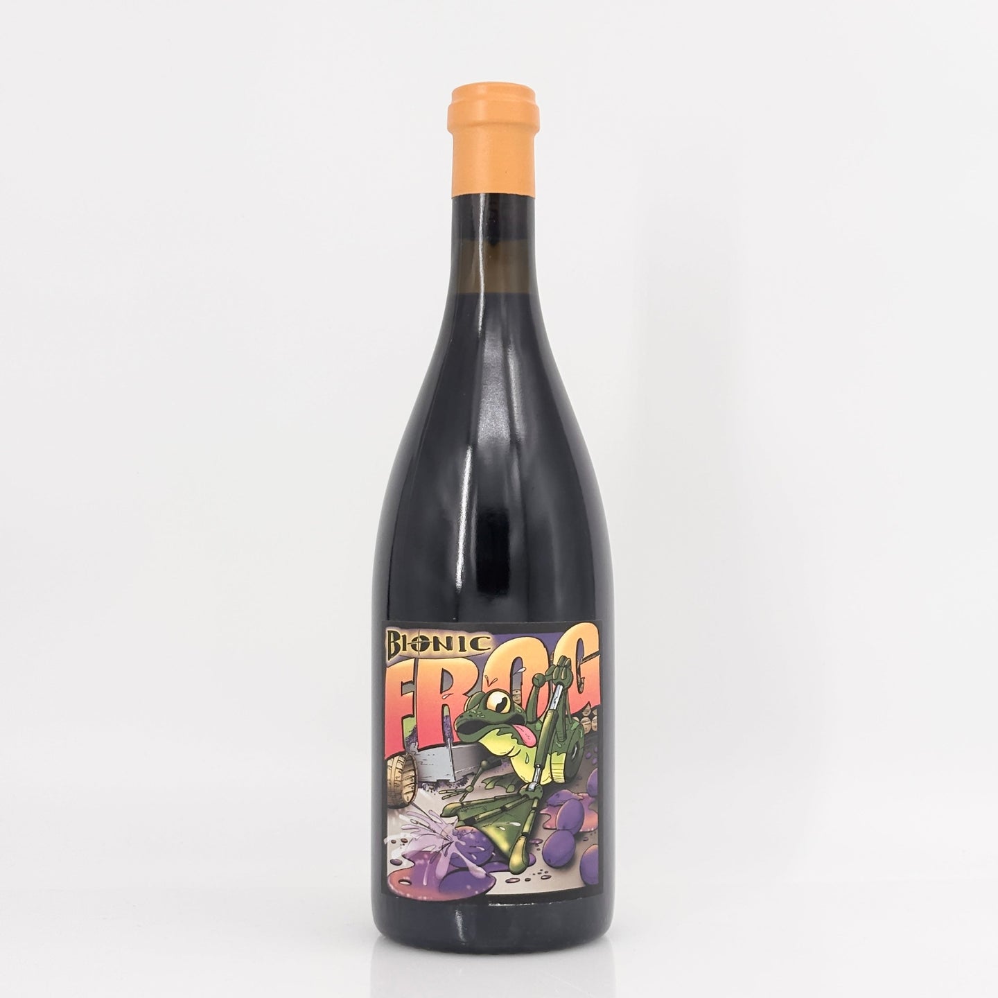 Bottle of wine with a colorful label featuring a frog illustration on a white background