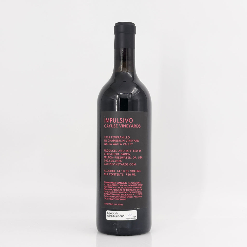 Wine bottle with 'Impulsivo' label on a white background