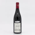 Wine bottle with a visible label on a white background