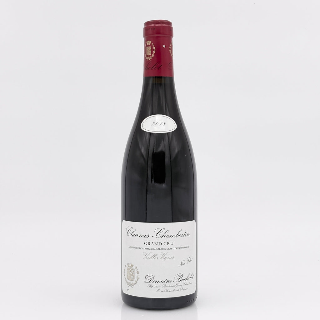 Wine bottle with a red label on a white background