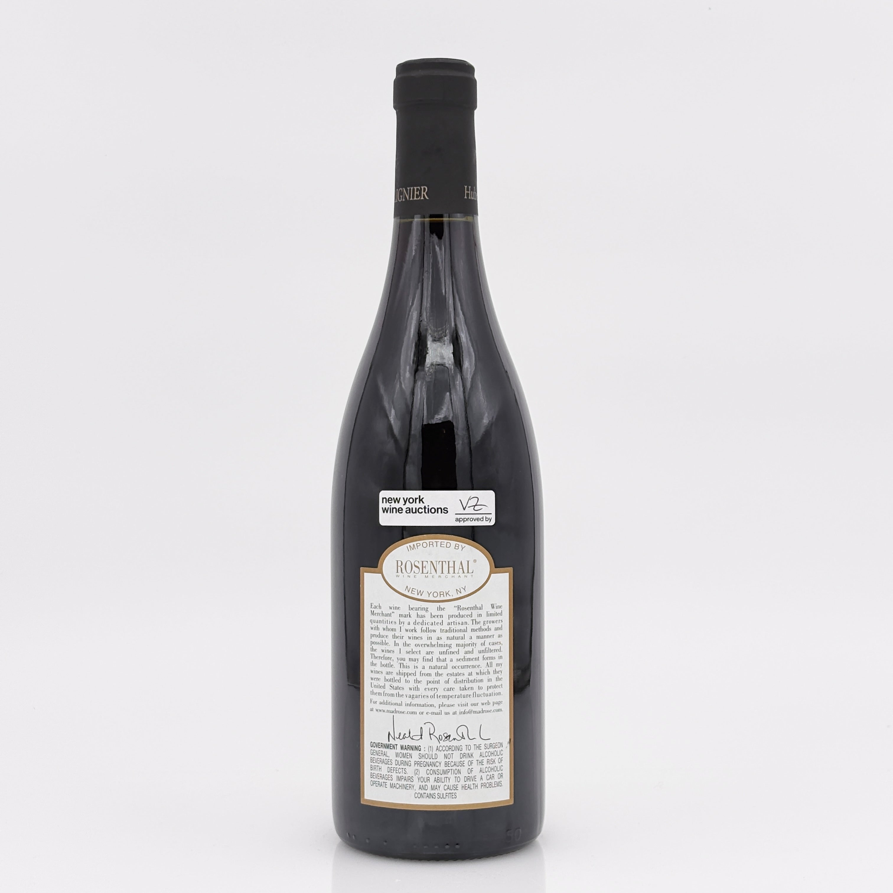 Wine bottle with a label on a white background