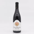 Wine bottle with a white label on a light gray background