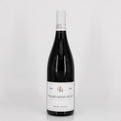 Wine bottle with a label on a white background