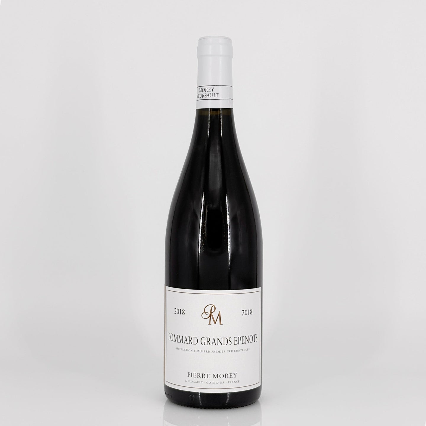 Wine bottle with a label on a white background