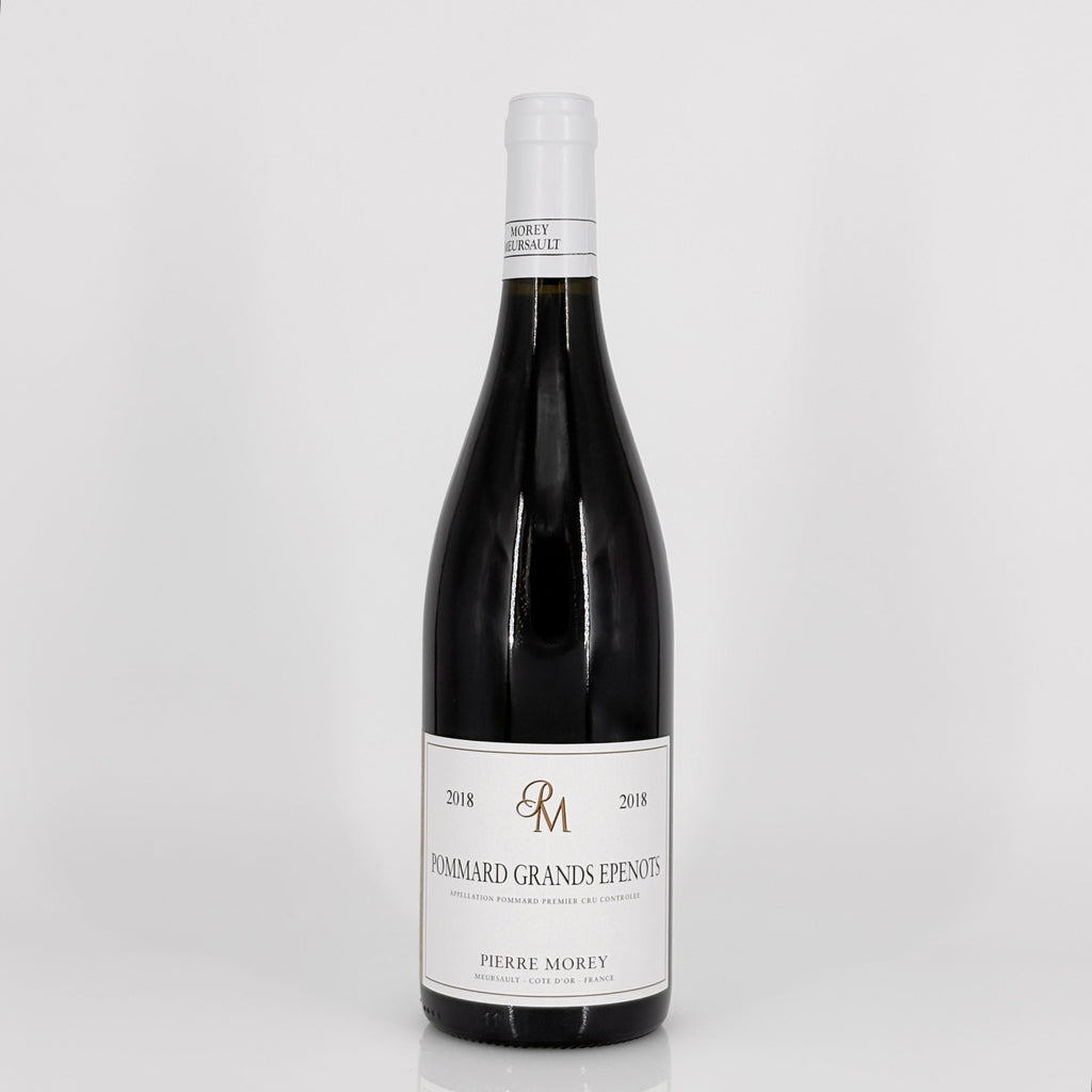 Wine bottle with a label on a white background