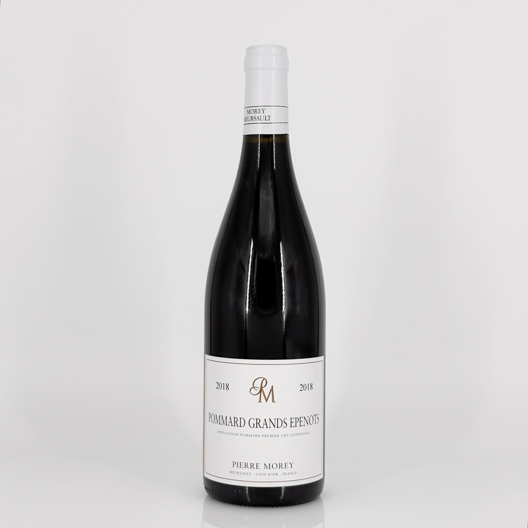 Wine bottle with a label on a white background