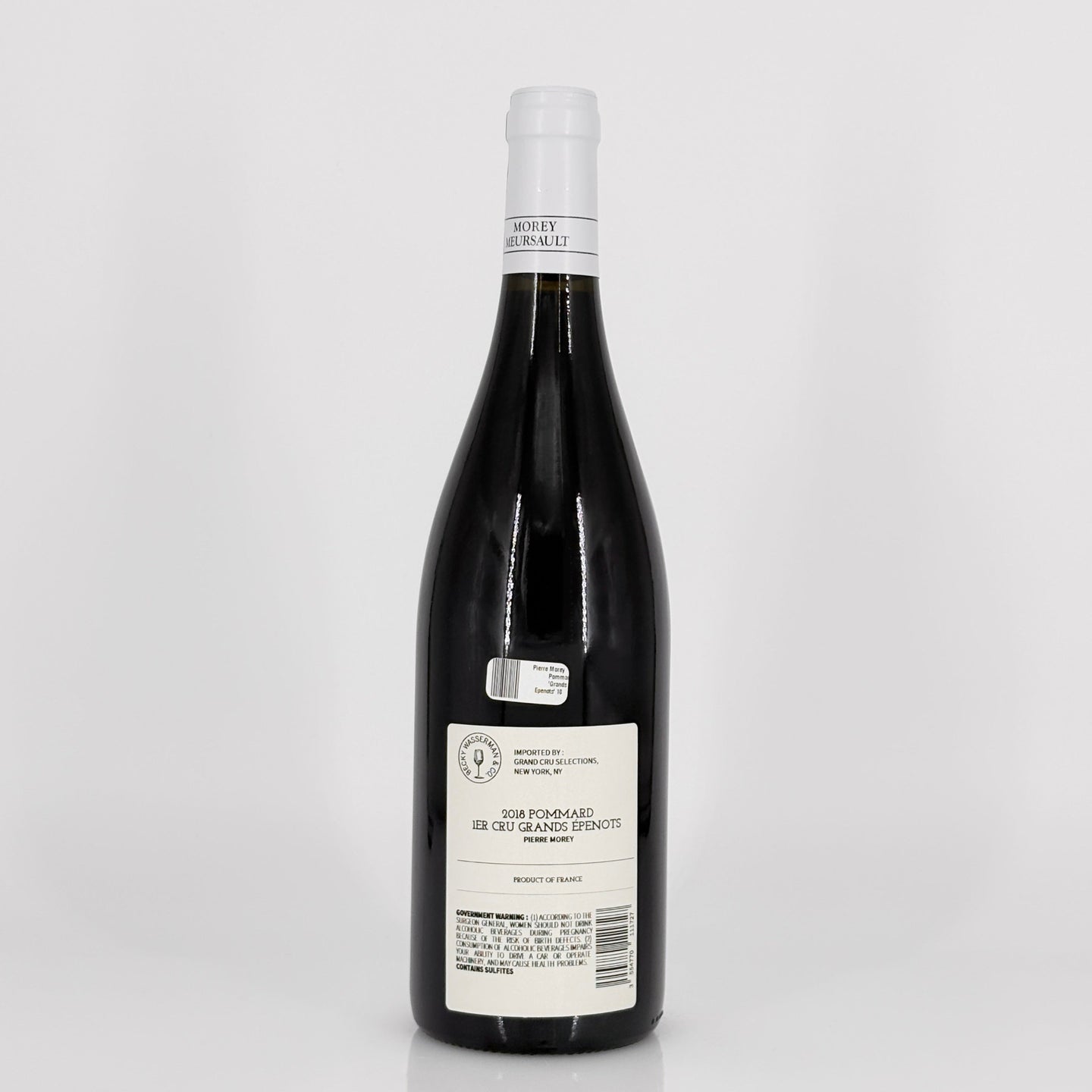 Wine bottle with a white label on a light gray background