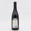 Wine bottle with a label on a white background
