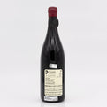 Wine bottle with a visible label on a white background