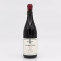 Wine bottle with a visible label on a white background