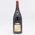 Large wine bottle with a visible label on a white background