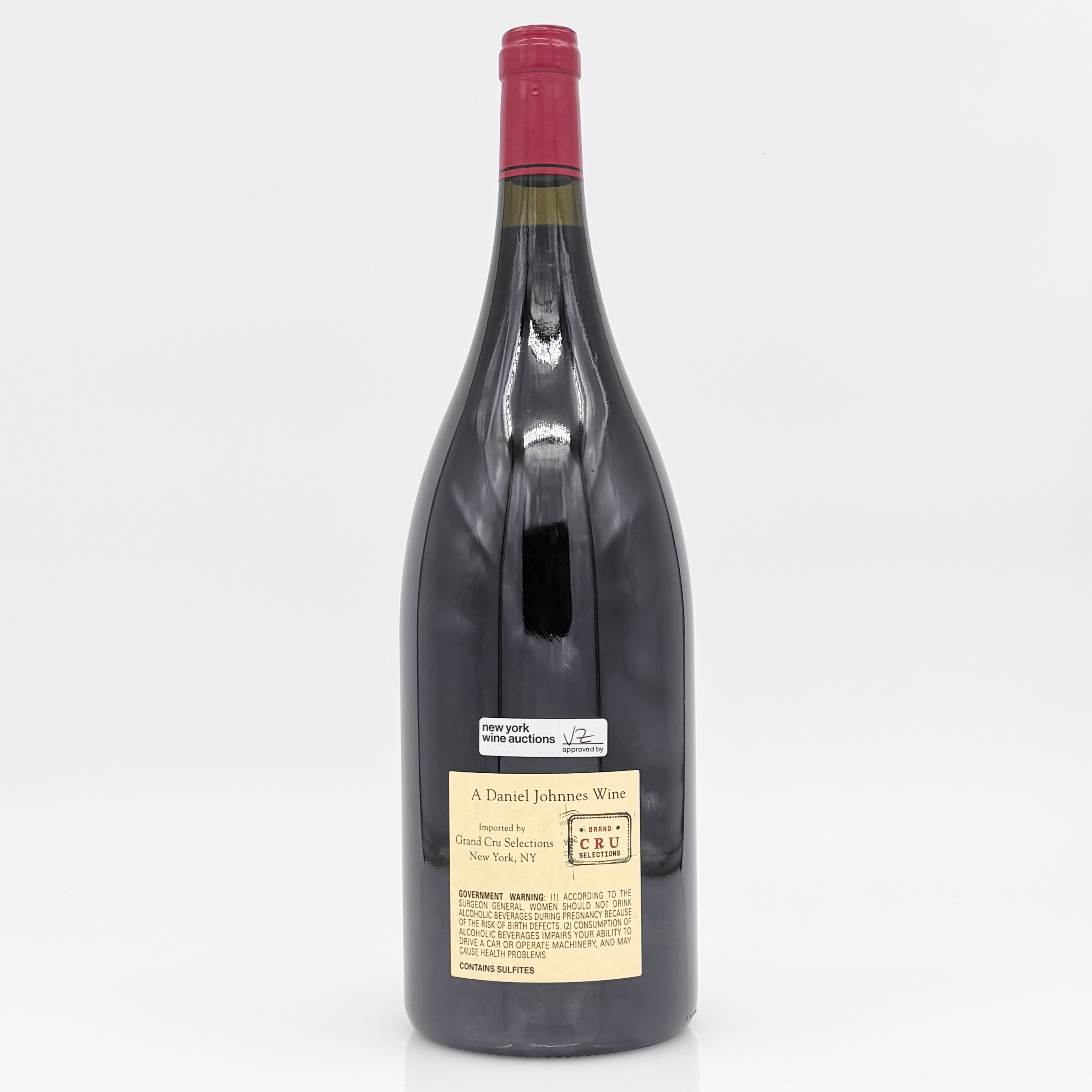 Large wine bottle with a visible label on a white background