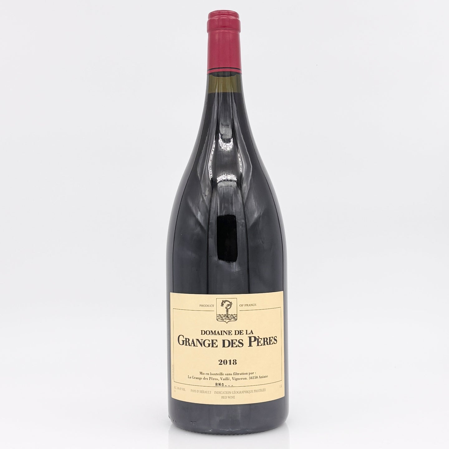 Wine bottle with yellow label on a white background