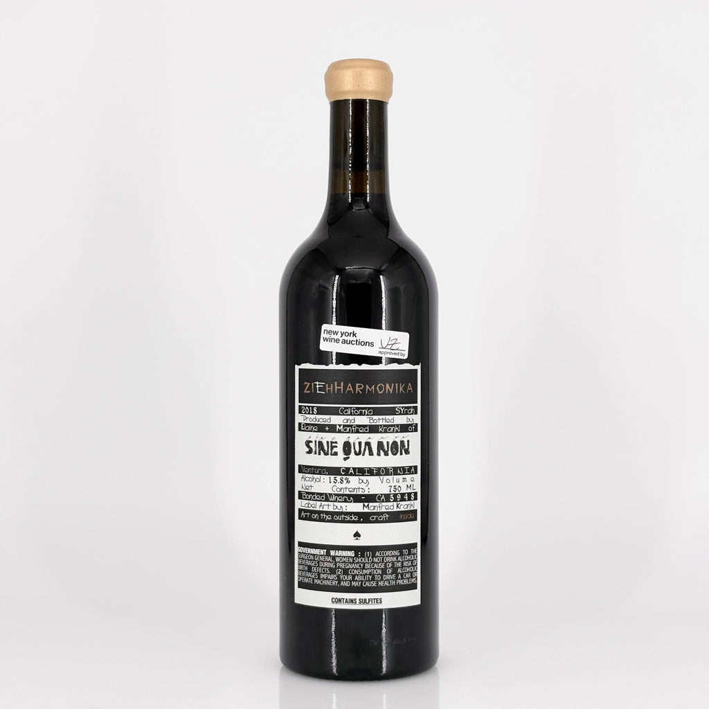 Wine bottle with a label on a white background