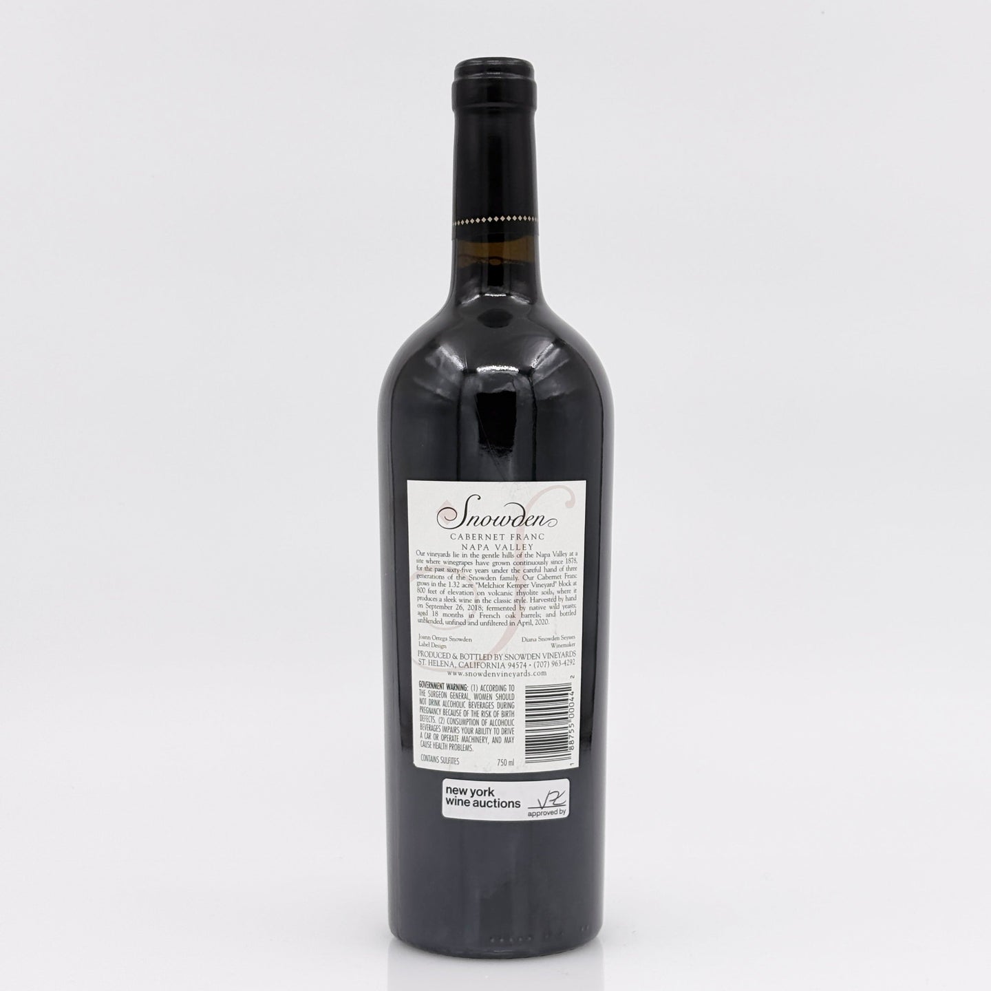 Wine bottle with a label on a white background