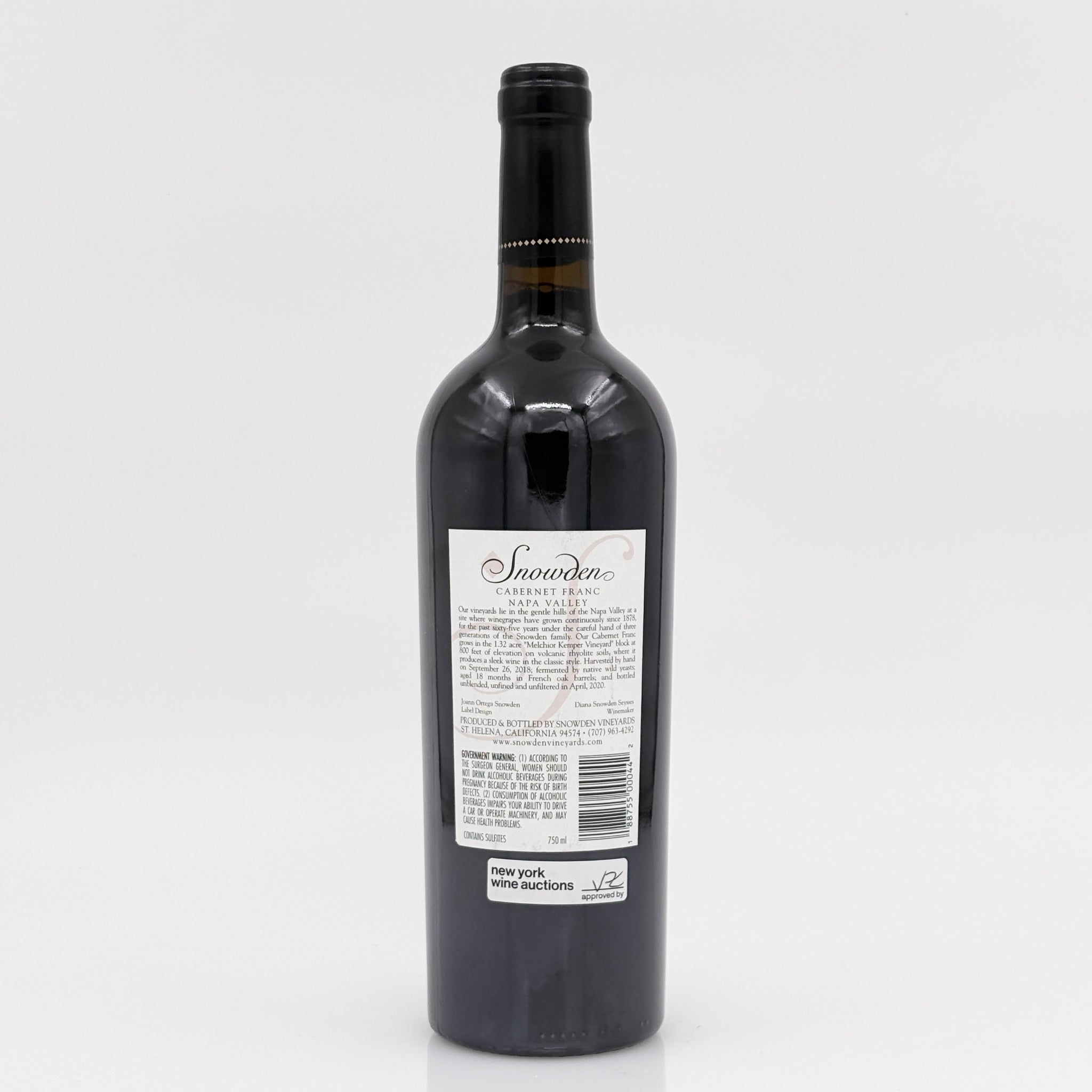 Wine bottle with a label on a white background