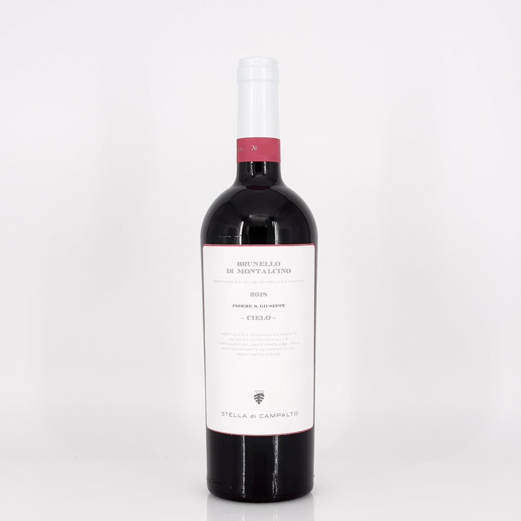 Red wine bottle with a white label on a light gray background
