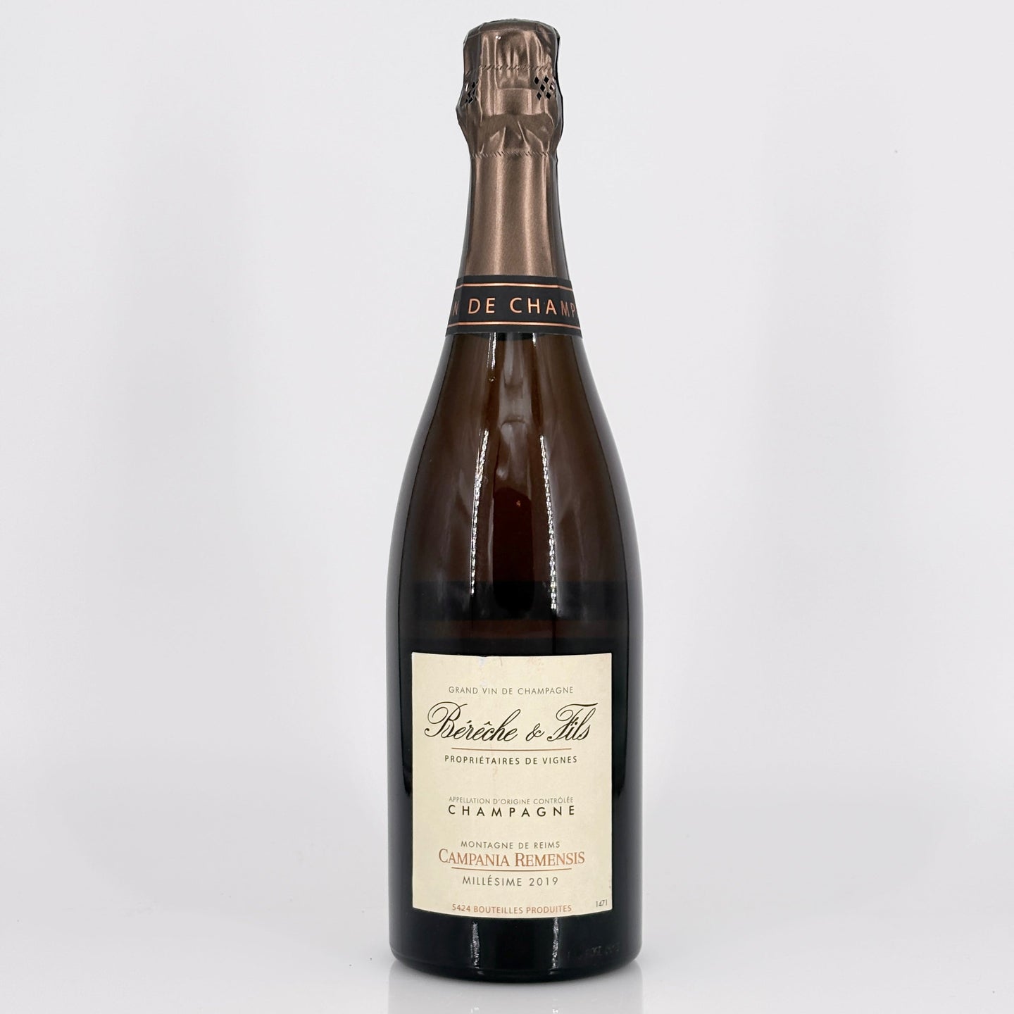 Bottle of champagne with a visible label on a white background