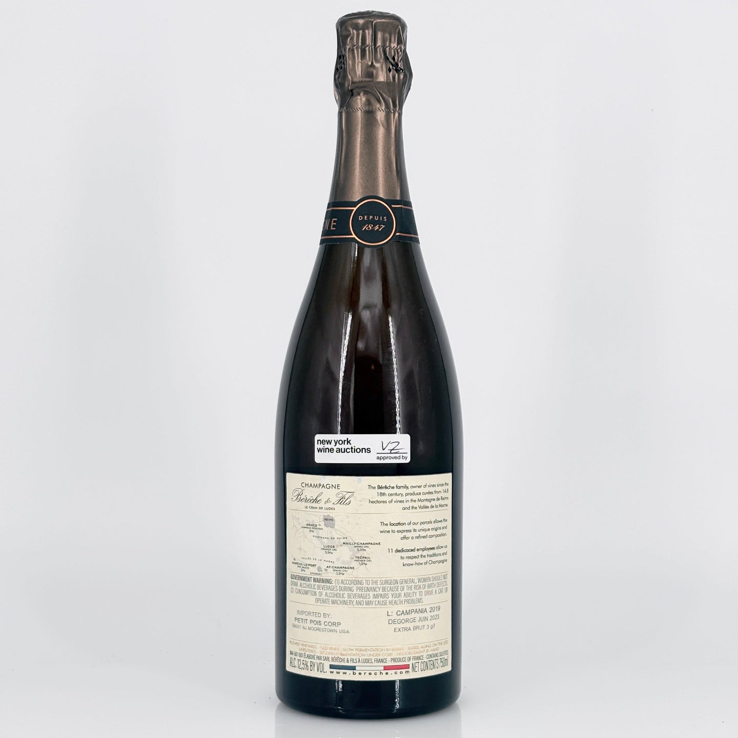 Wine bottle with a label on a white background
