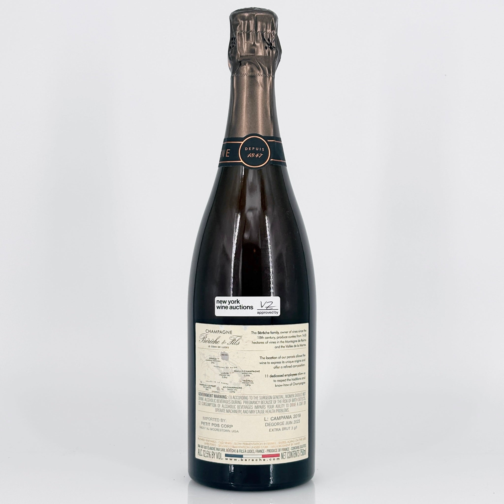 Wine bottle with a label on a white background