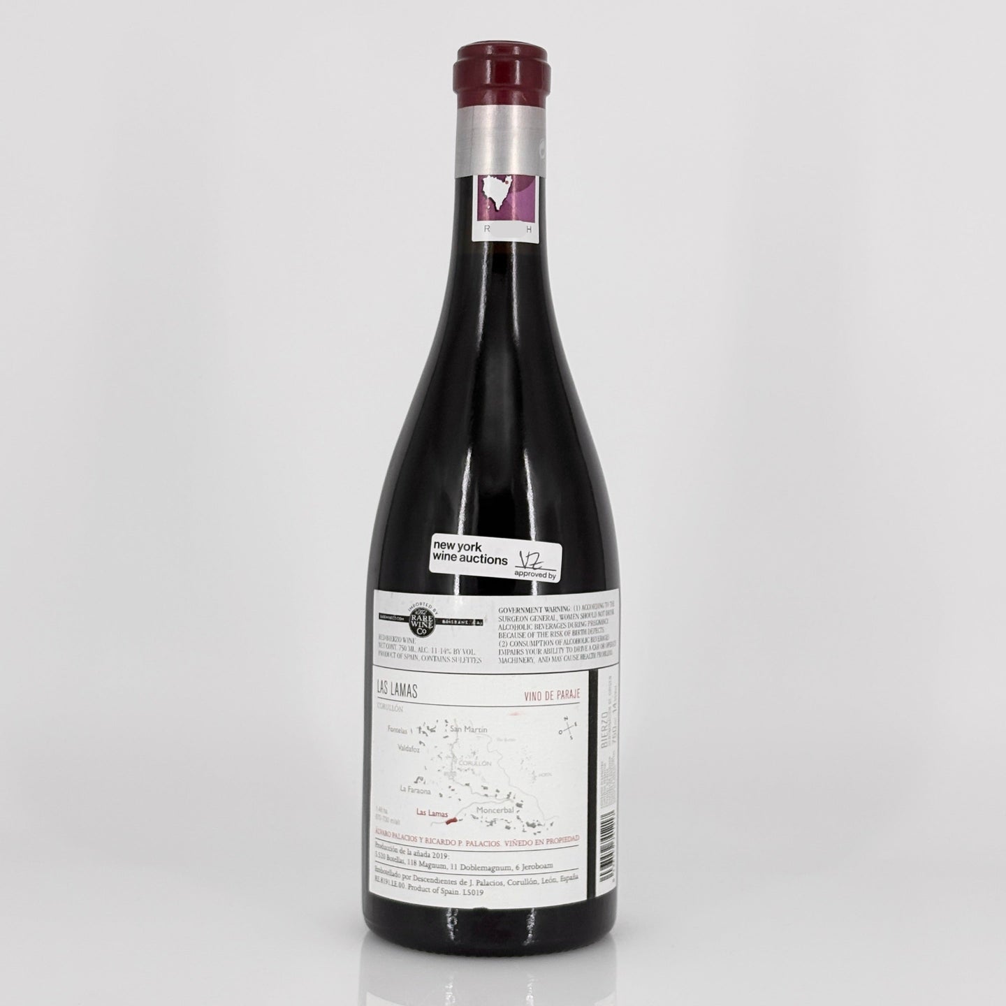 Wine bottle with a label on a white background