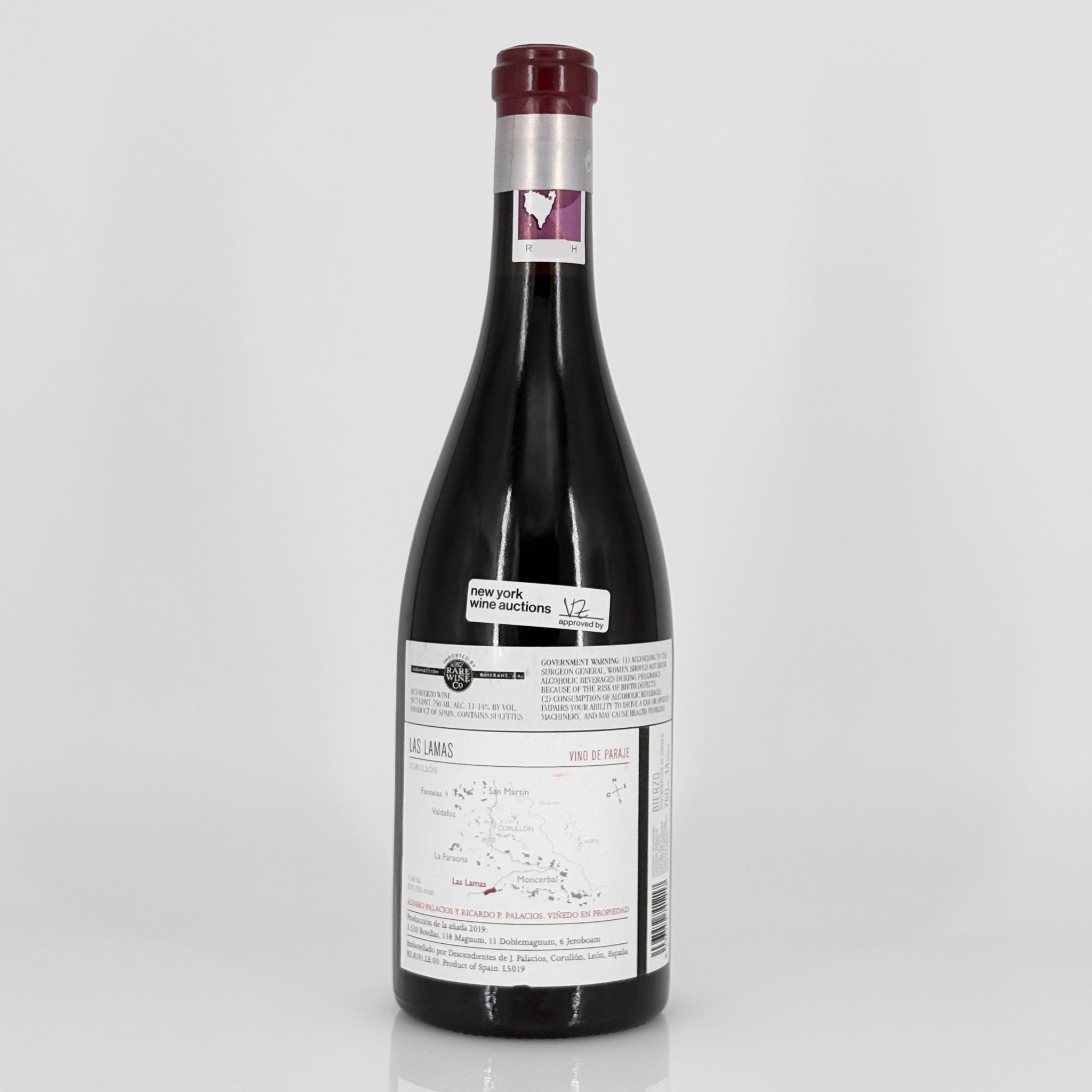 Wine bottle with a label on a white background