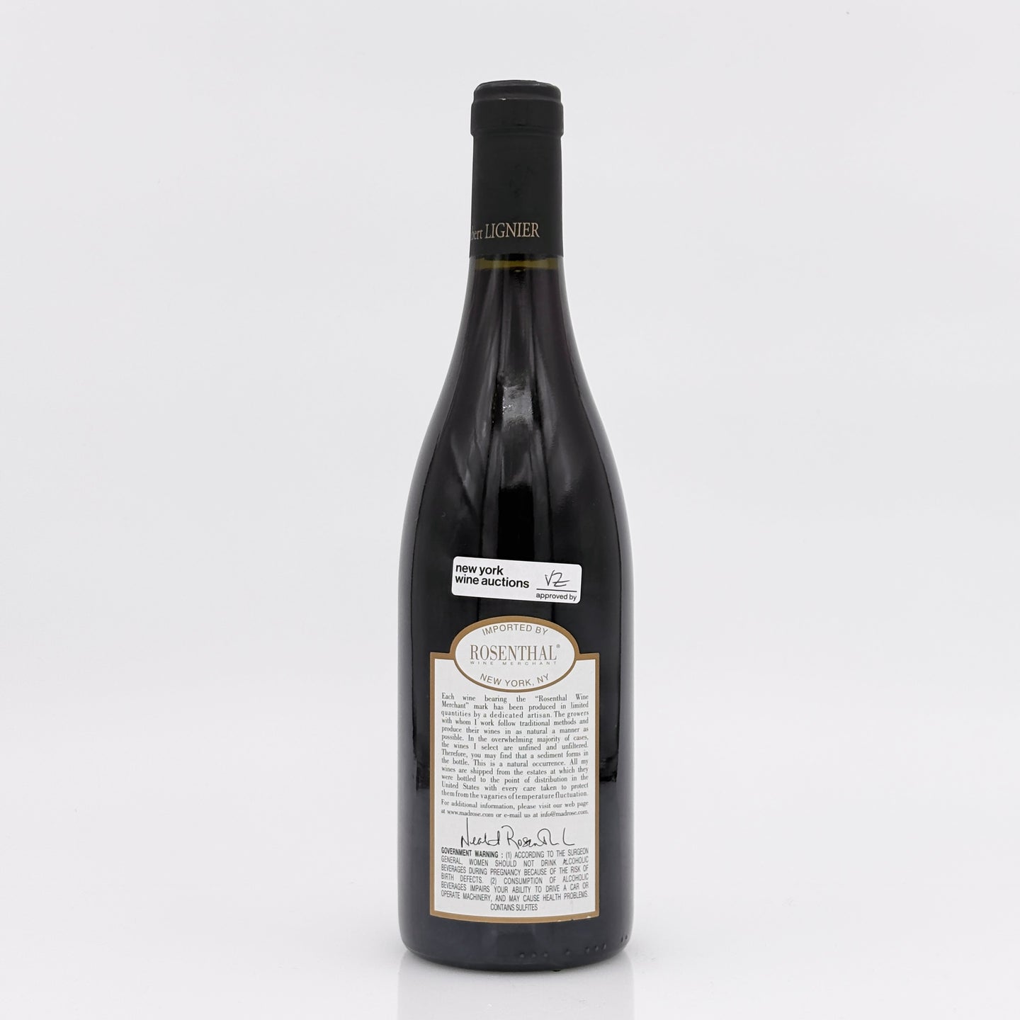 Wine bottle with a label on a white background