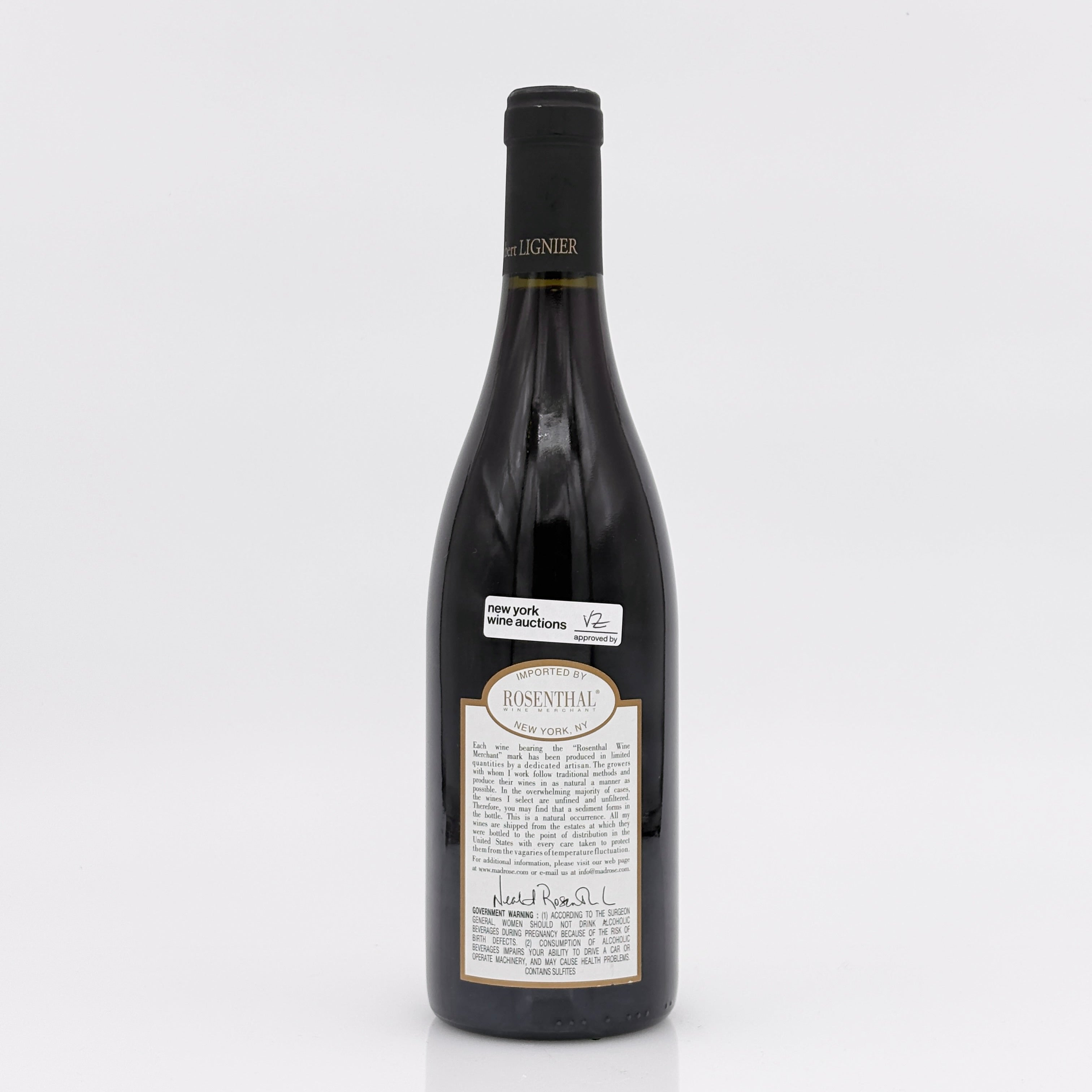 Wine bottle with a label on a white background