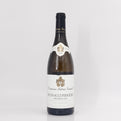 Wine bottle with a white label on a light gray background