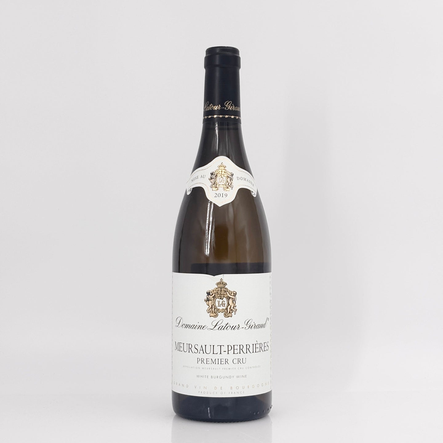 Wine bottle with a white label on a light gray background