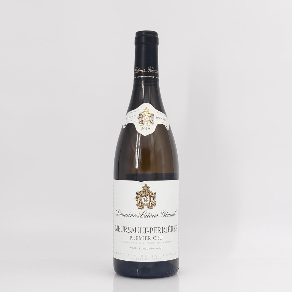 Wine bottle with a white label on a light gray background