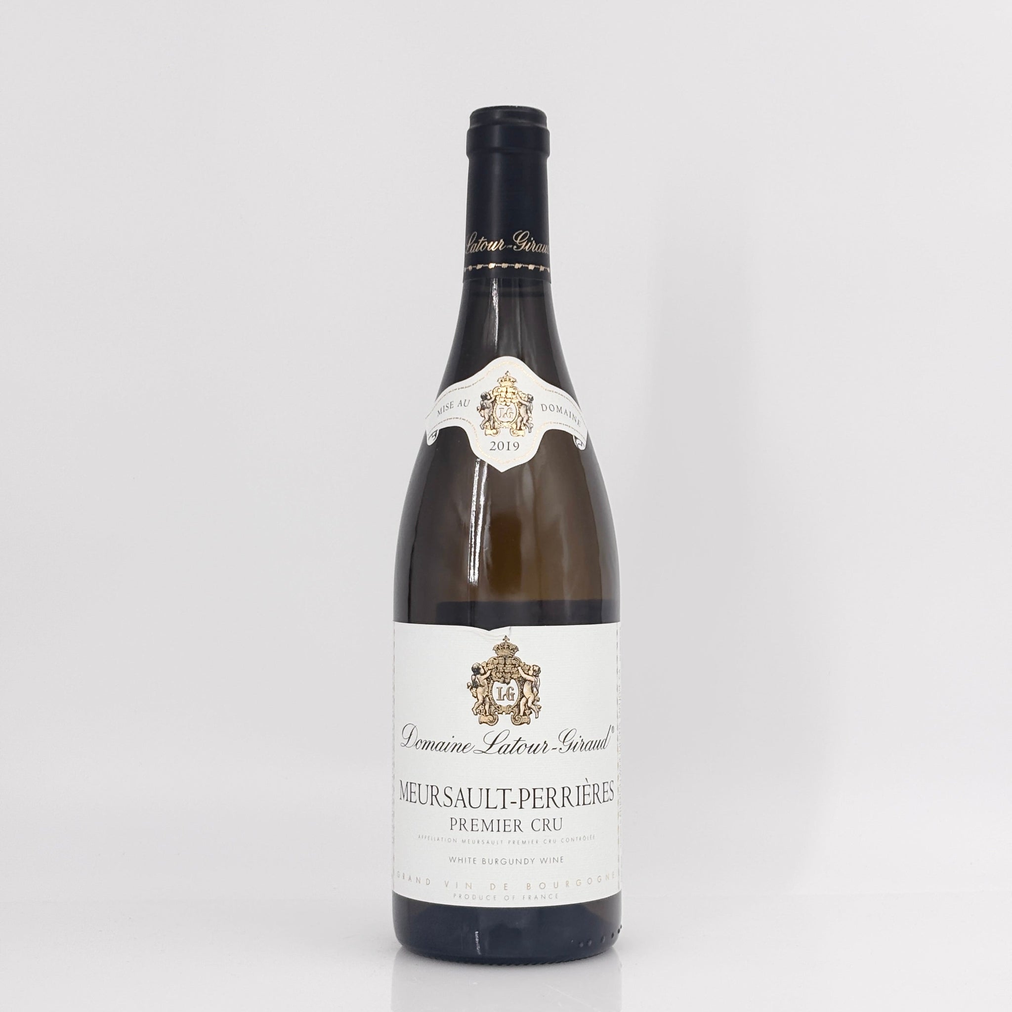 Wine bottle with a white label on a light gray background