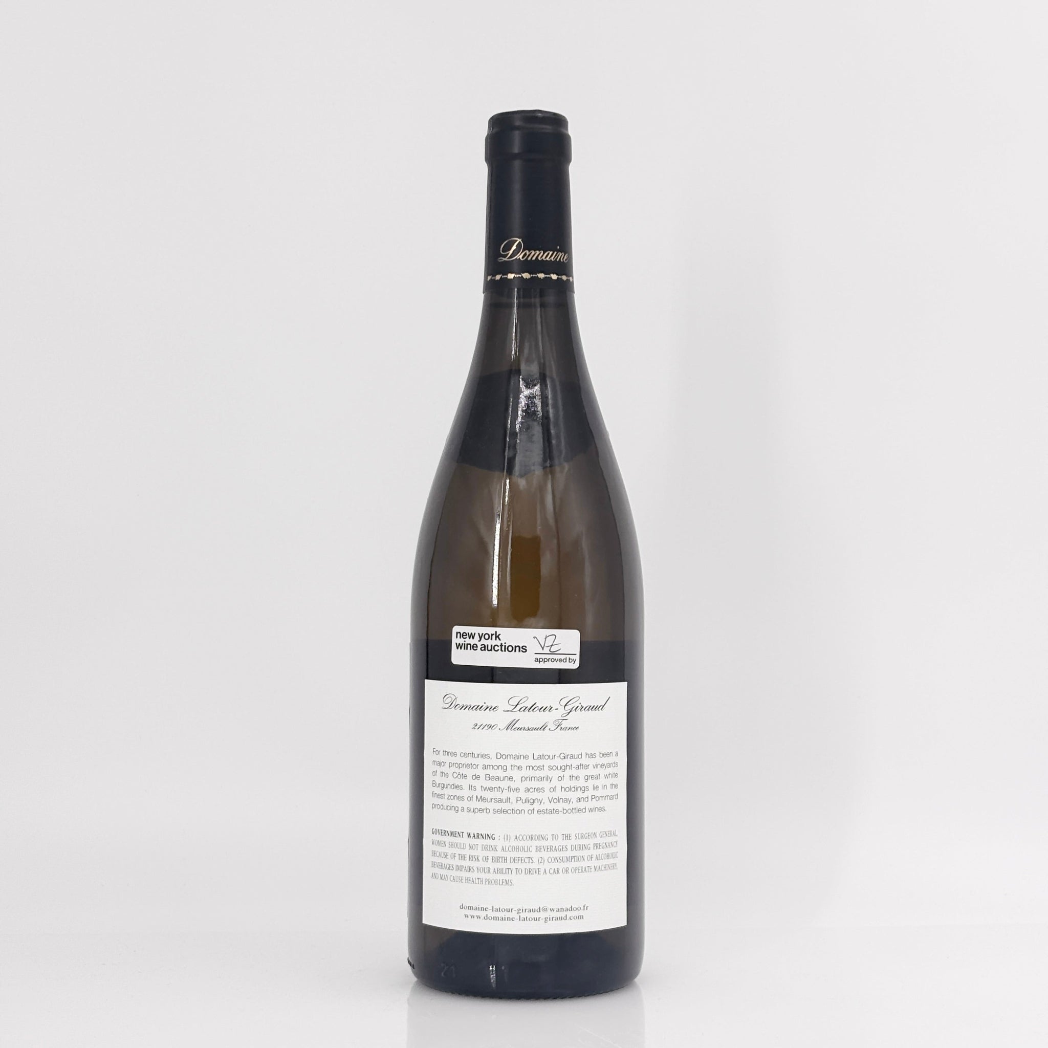 Wine bottle with a label on a white background