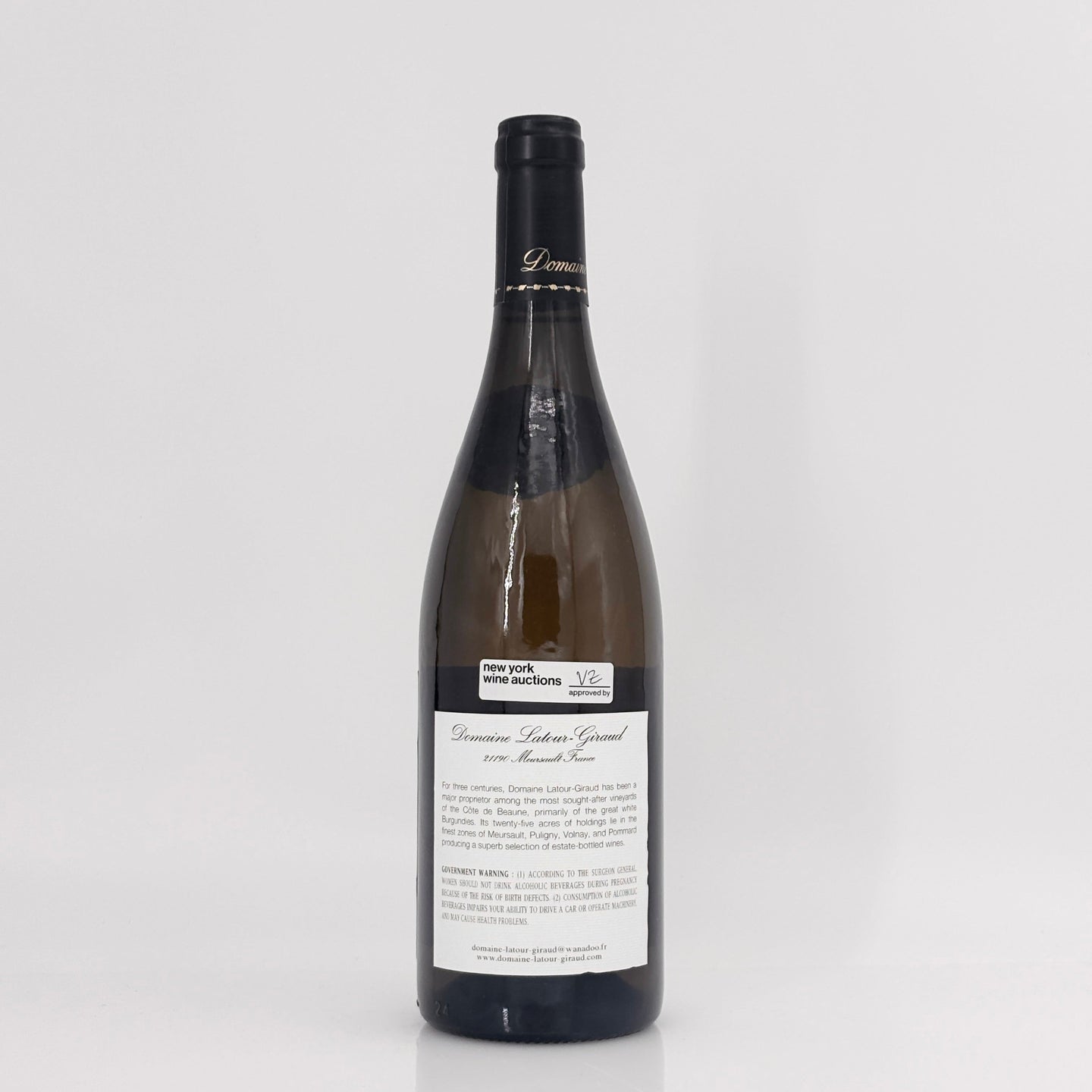 Wine bottle with a label on a white background