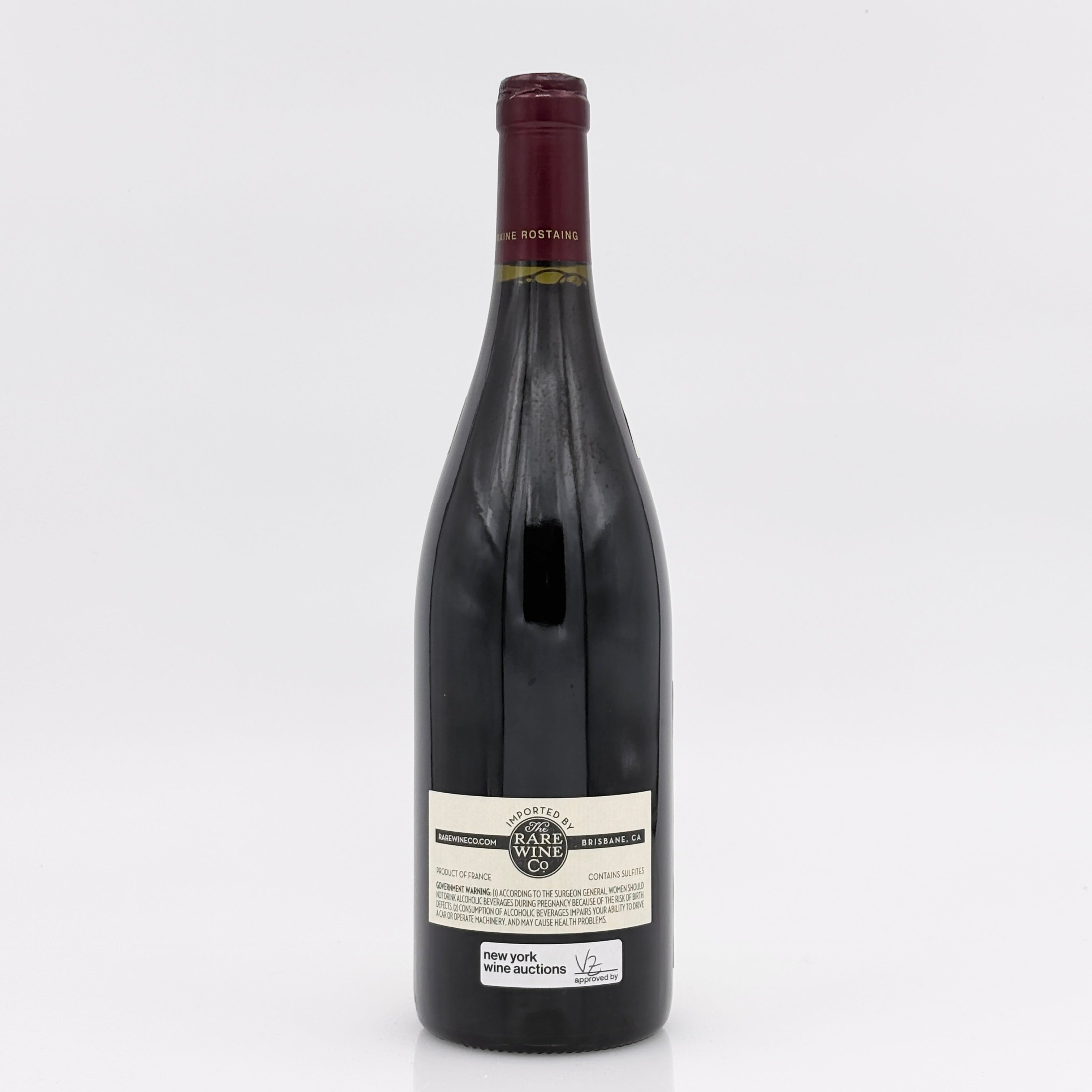 Wine bottle with a label on a white background